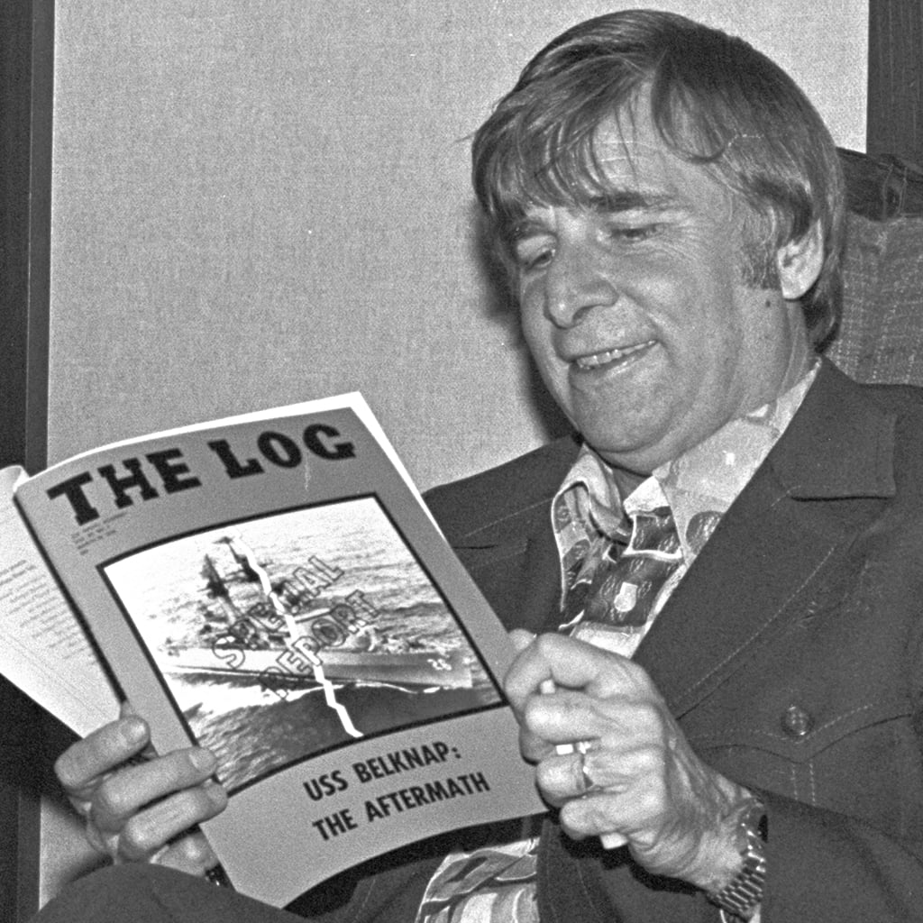 A photo of Gene Roddenberry Reading the Log